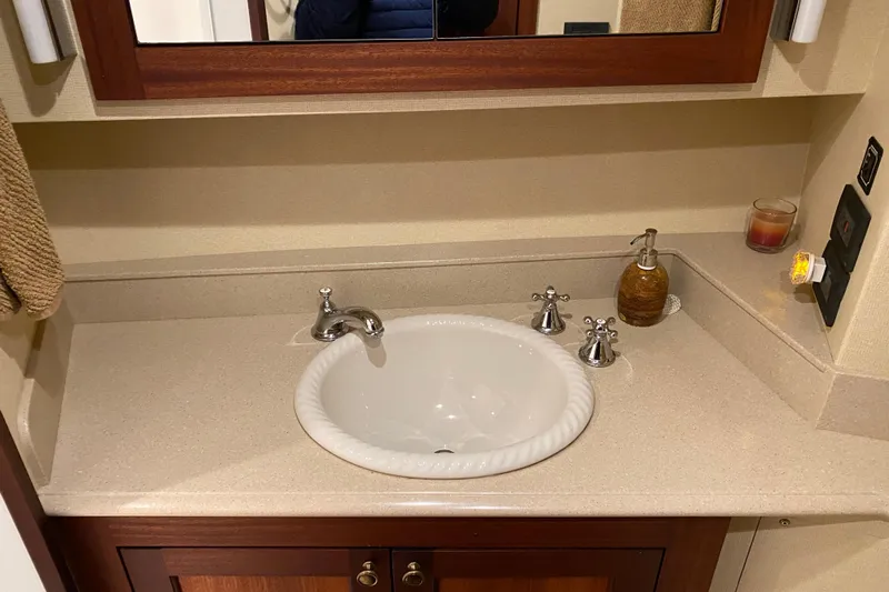 Nomad Yacht Photos Pics Bathroom sink area in a 2003 Northern Marine 57 Raised Pilothouse yacht.