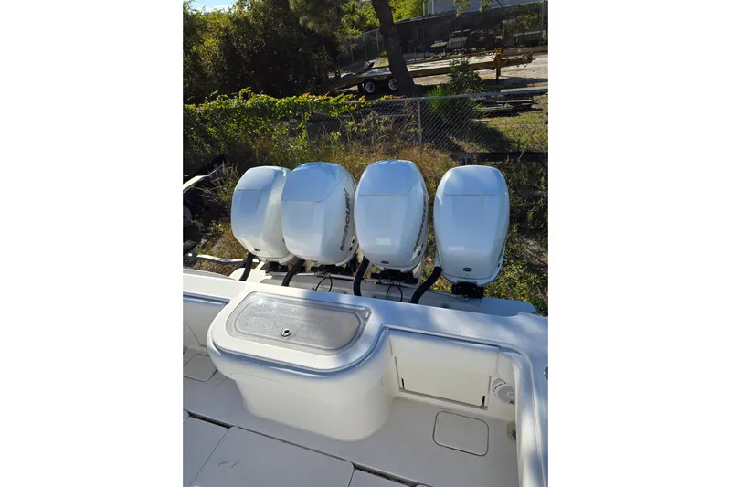  Yacht Photos Pics Four powerful outboard engines on a 2013 Invincible 42 Open Fisherman boat.