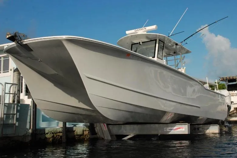  Yacht Photos Pics 2024 Tideline 365 boat docked, showcasing sleek design and modern features.