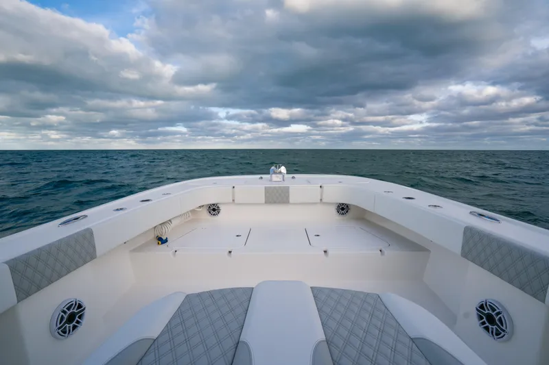  Yacht Photos Pics 2024 Tideline 365 boat on open sea under cloudy sky.