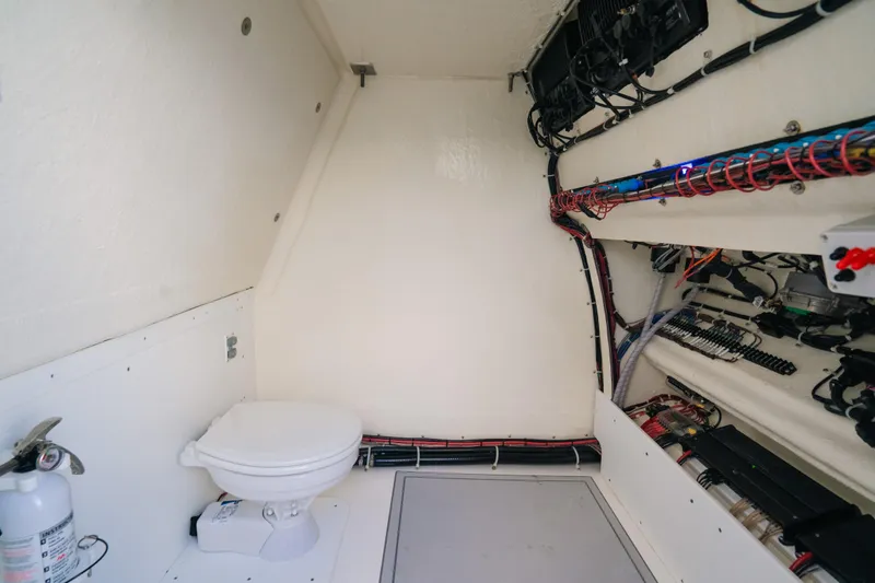  Yacht Photos Pics 2024 Tideline 365 boat interior with toilet and electrical wiring.
