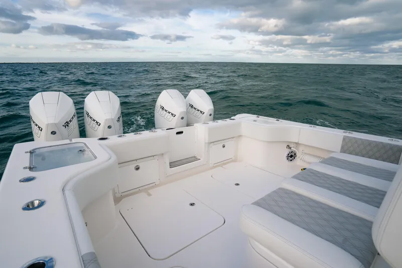  Yacht Photos Pics 2024 Tideline 365 boat with four outboard engines on open water.