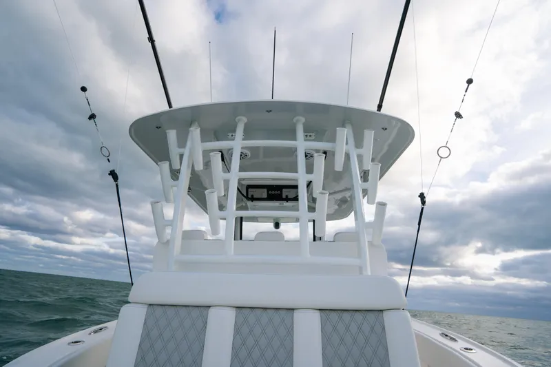  Yacht Photos Pics 2024 Tideline 365 boat on open water under cloudy sky.
