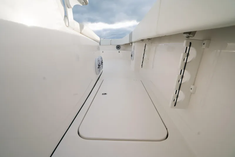  Yacht Photos Pics 2024 Tideline 365 boat interior, showcasing sleek white design and modern features.
