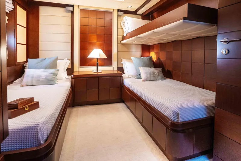 Koukles Yacht Photos Pics Luxurious cabin interior of 2008 Azimut 95 E yacht with twin beds and elegant decor.