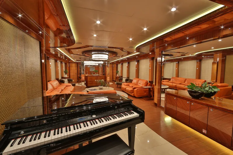 Elada Yacht Photos Pics Luxurious Bilgin 147 yacht interior with grand piano, elegant seating, and modern lighting, 2014 model.