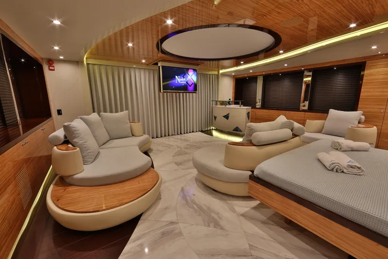 Elada Yacht Photos Pics Luxurious interior of 2014 Bilgin 147 yacht with modern seating and elegant decor.