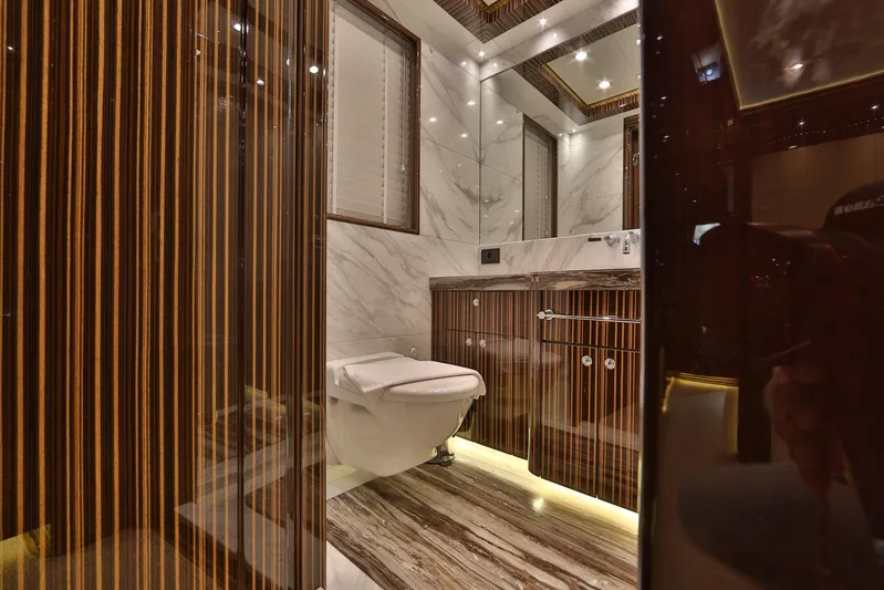 Elada Yacht Photos Pics Luxurious bathroom interior on Bilgin 147 yacht, featuring marble and wood accents, 2014 model.