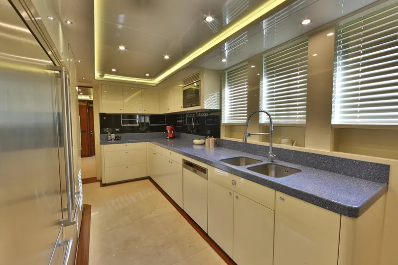 Elada Yacht Photos Pics Luxurious yacht kitchen with modern design, Bilgin 147, 2014 model, featuring sleek countertops and ample lighting.