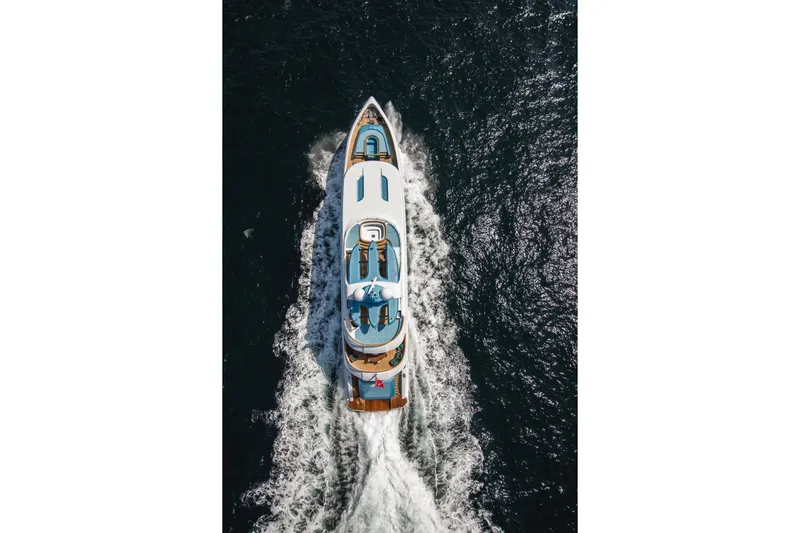 Elada Yacht Photos Pics Aerial view of 2014 Bilgin 147 yacht cruising on open water.