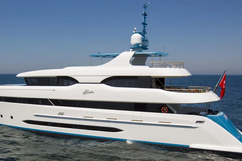 Elada Yacht Photos Pics Luxurious 2014 Bilgin 147 yacht cruising on open sea, featuring sleek white design.