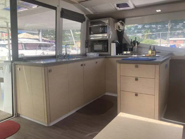 Knot On Call Yacht Photos Pics Modern kitchen interior of 2018 Fountaine Pajot Helia 44 Evolution catamaran.