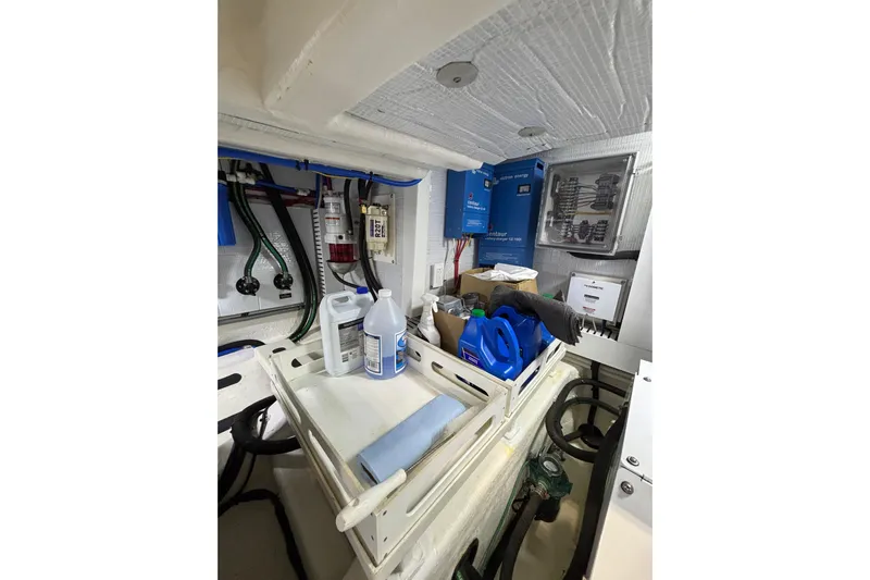 Cellibrate Yacht Photos Pics Engine room of 2020 Sabre 45 Salon Express with maintenance supplies and equipment.