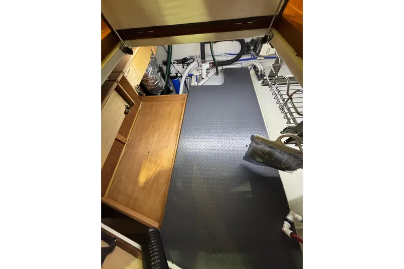 Cellibrate Yacht Photos Pics Engine room of 2020 Sabre 45 Salon Express with organized equipment and storage.