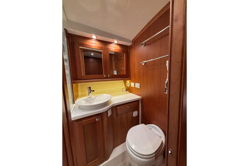 Cellibrate Yacht Photos Pics Luxurious bathroom in 2020 Sabre 45 Salon Express yacht with wooden cabinetry.