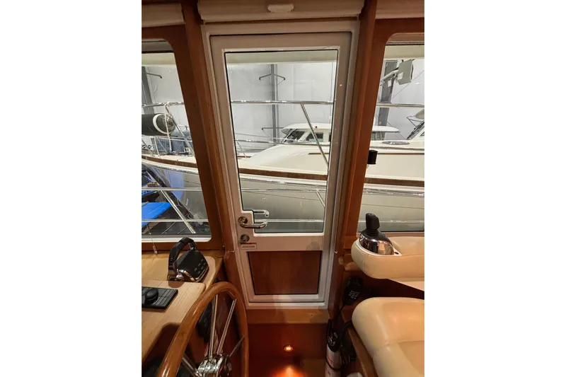 Cellibrate Yacht Photos Pics Interior view of 2020 Sabre 45 Salon Express yacht helm station.