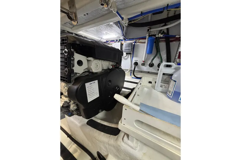 Cellibrate Yacht Photos Pics Engine room of 2020 Sabre 45 Salon Express with visible components and equipment.