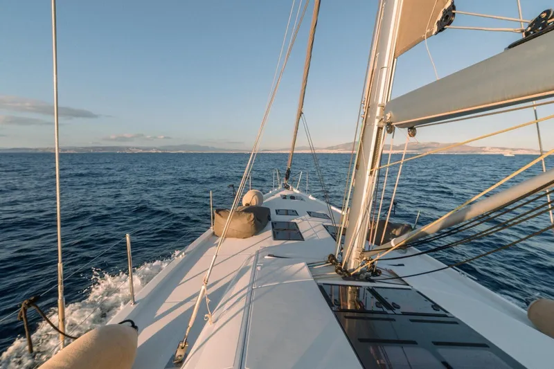 Euphoria Yacht Photos Pics 2021 Jeanneau 60 sailboat navigating open sea under clear skies.