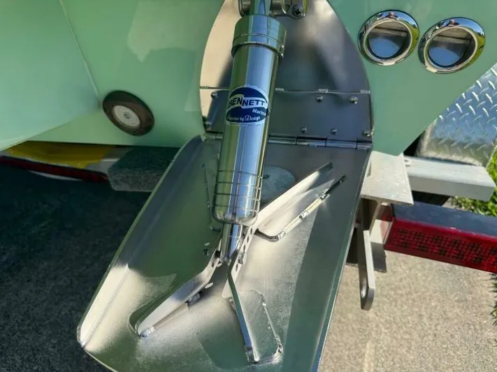 Wicked Tuna Yacht Photos Pics Boat trim tab system on a 2021 Custom Vernese V23, featuring Bennett Marine components.