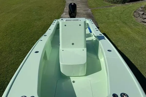 Wicked Tuna Yacht Photos Pics Custom Vernese V23 boat, 2021 model, light green deck, outdoor setting.