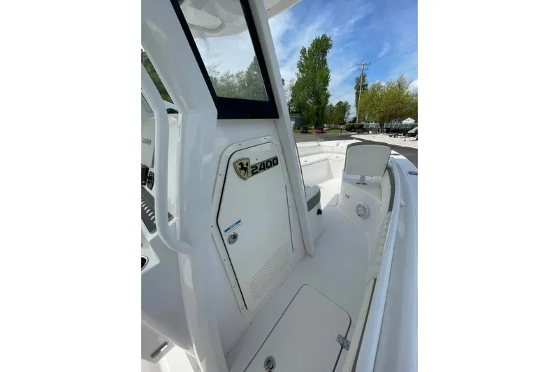 Century 2400cc Yacht Photos Pics 2022 Century 2400 Center Console boat interior with seating and storage compartments.
