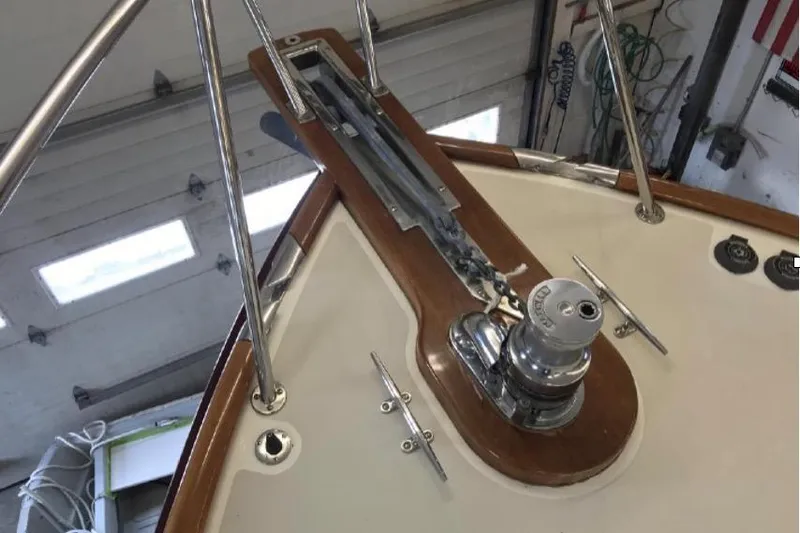 Skylark Yacht Photos Pics Bow of 2005 Lyman-Morse Monhegan yacht with winch and cleats in a workshop.