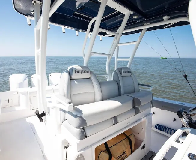 Done Diggin Yacht Photos Pics 2019 Everglades 355 Center Console boat interior with ocean view and seating.