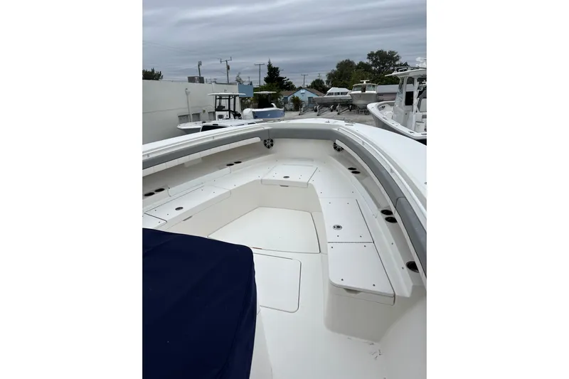  Yacht Photos Pics 2023 Regulator 41 boat with spacious deck and seating area.