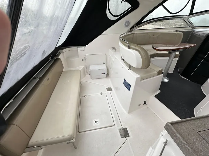 Beautify Yacht Photos Pics Interior of 2010 Regal 3760 Sportyacht with seating and table.