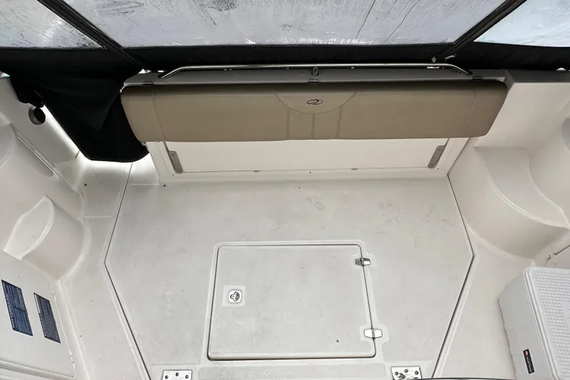 Beautify Yacht Photos Pics 2010 Regal 3760 Sportyacht interior with seating and storage compartment.