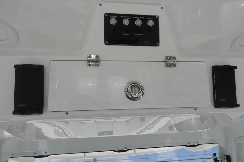  Yacht Photos Pics Control panel of 2025 Sea Fox 328 Commander boat with switches and speakers.