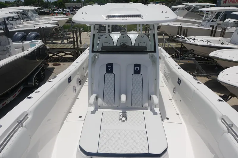  Yacht Photos Pics 2025 Sea Fox 328 Commander boat with sleek white interior and dual seating.