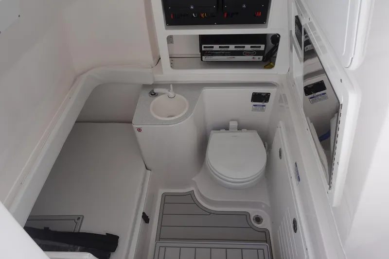  Yacht Photos Pics 2025 Sea Fox 328 Commander boat interior with toilet and sink.