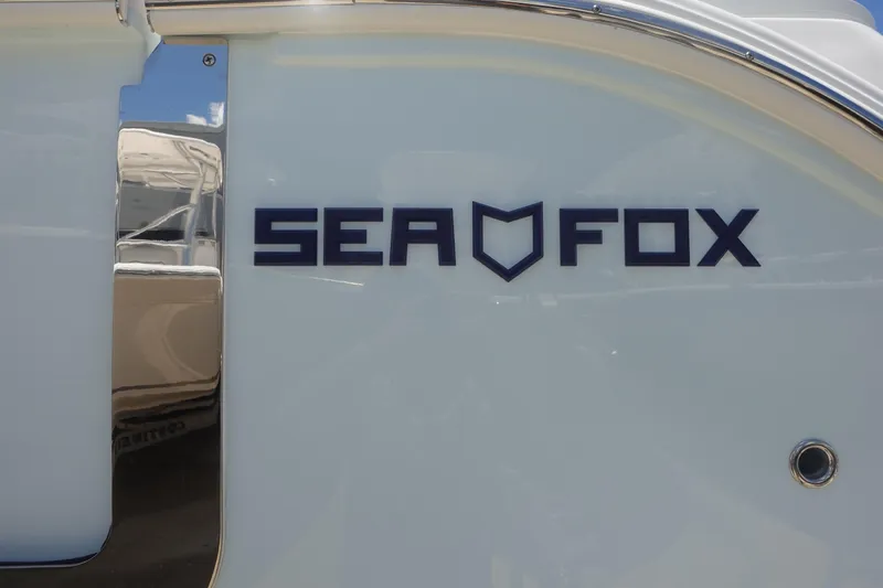  Yacht Photos Pics Sea Fox 328 Commander 2025 logo on boat exterior.