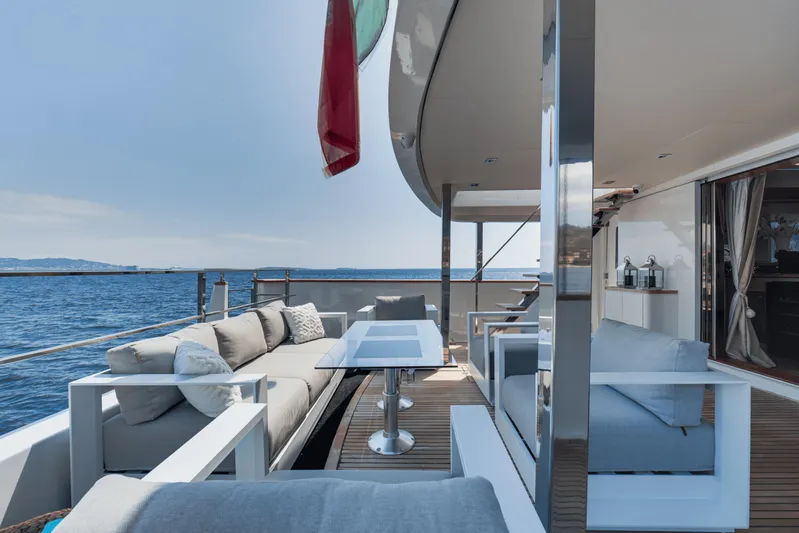 Eva Yacht Photos Pics Luxurious deck of a 1992 Cheoy Lee Custom yacht with ocean view.