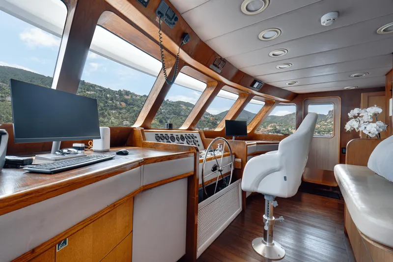 Eva Yacht Photos Pics Interior of 1992 Cheoy Lee Custom yacht with modern navigation equipment and panoramic windows.