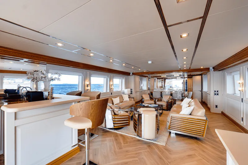 Eva Yacht Photos Pics Luxurious interior of 1992 Cheoy Lee Custom yacht with modern furnishings and ocean view.