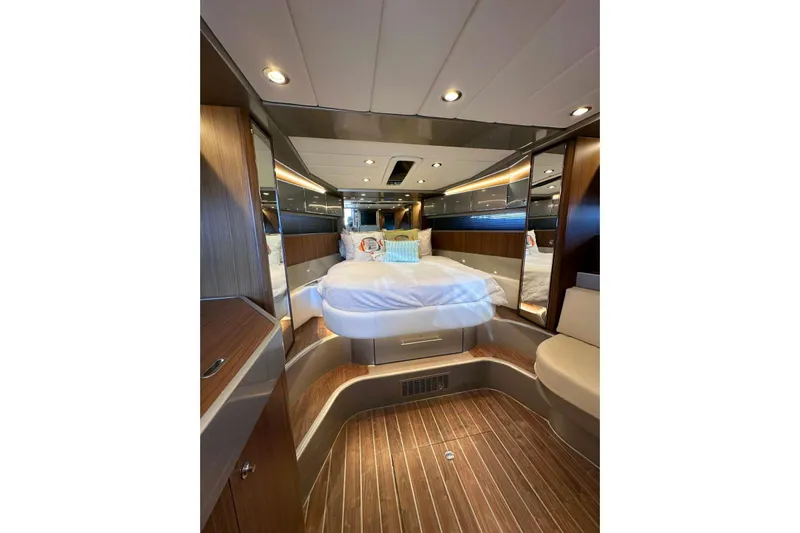  Yacht Photos Pics Luxurious interior of 2005 Riva RivaRama 44 yacht with elegant wood finishes.