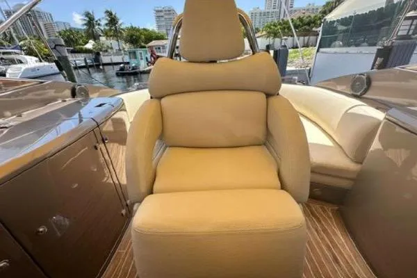  Yacht Photos Pics Luxurious seating on 2005 Riva RivaRama 44 yacht, docked in a marina.