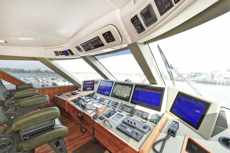 On The Edge Yacht Photos Pics Control room of 2018 Viking 80 Enclosed Skybridge yacht with advanced navigation systems.
