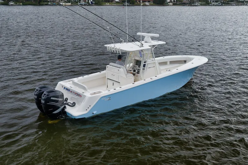  Yacht Photos Pics 2023 SeaVee 322Z boat on water, featuring dual Mercury engines.