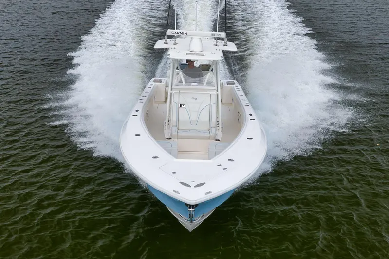  Yacht Photos Pics 2023 SeaVee 322Z boat cruising on open water, aerial view.
