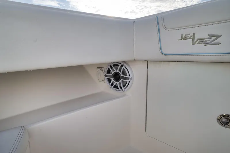  Yacht Photos Pics 2023 SeaVee 322Z boat interior with speaker and logo detail.