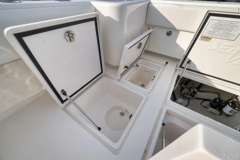  Yacht Photos Pics 2023 SeaVee 322Z boat storage compartments and utility access.