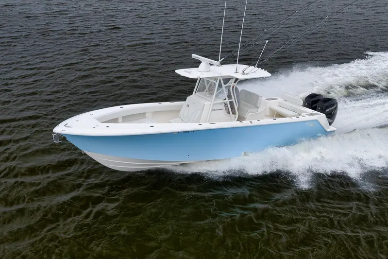  Yacht Photos Pics 2023 SeaVee 322Z boat cruising on open water, showcasing sleek design and powerful engines.