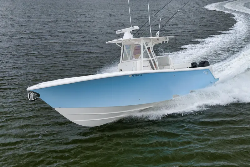  Yacht Photos Pics 2023 SeaVee 322Z boat cruising on open water, showcasing sleek design and performance.