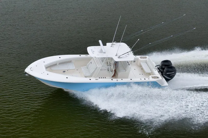  Yacht Photos Pics 2023 SeaVee 322Z boat cruising on water with dual outboard engines.