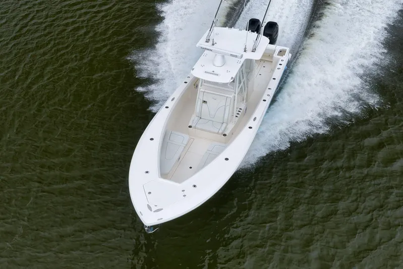  Yacht Photos Pics 2023 SeaVee 322Z boat cruising on water, aerial view.