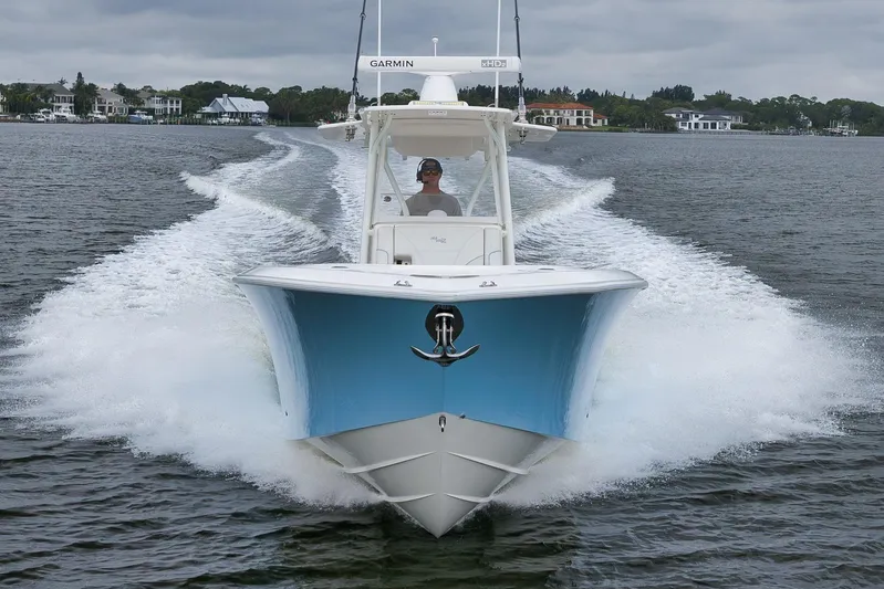  Yacht Photos Pics 2023 SeaVee 322Z boat cruising on water, showcasing sleek design and powerful performance.