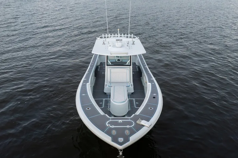  Yacht Photos Pics 2018 Yellowfin 39 Offshore boat on calm water, aerial view.